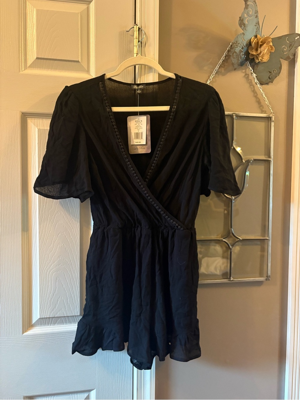 NWT Lily Rose Black Wrap Front Romper Size M Crochet Trim Flutter Sleeve